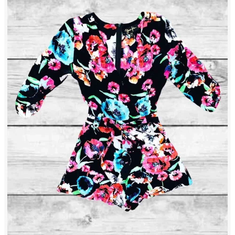 Yumi Kim romper. Size small. Black floral print shorts romper